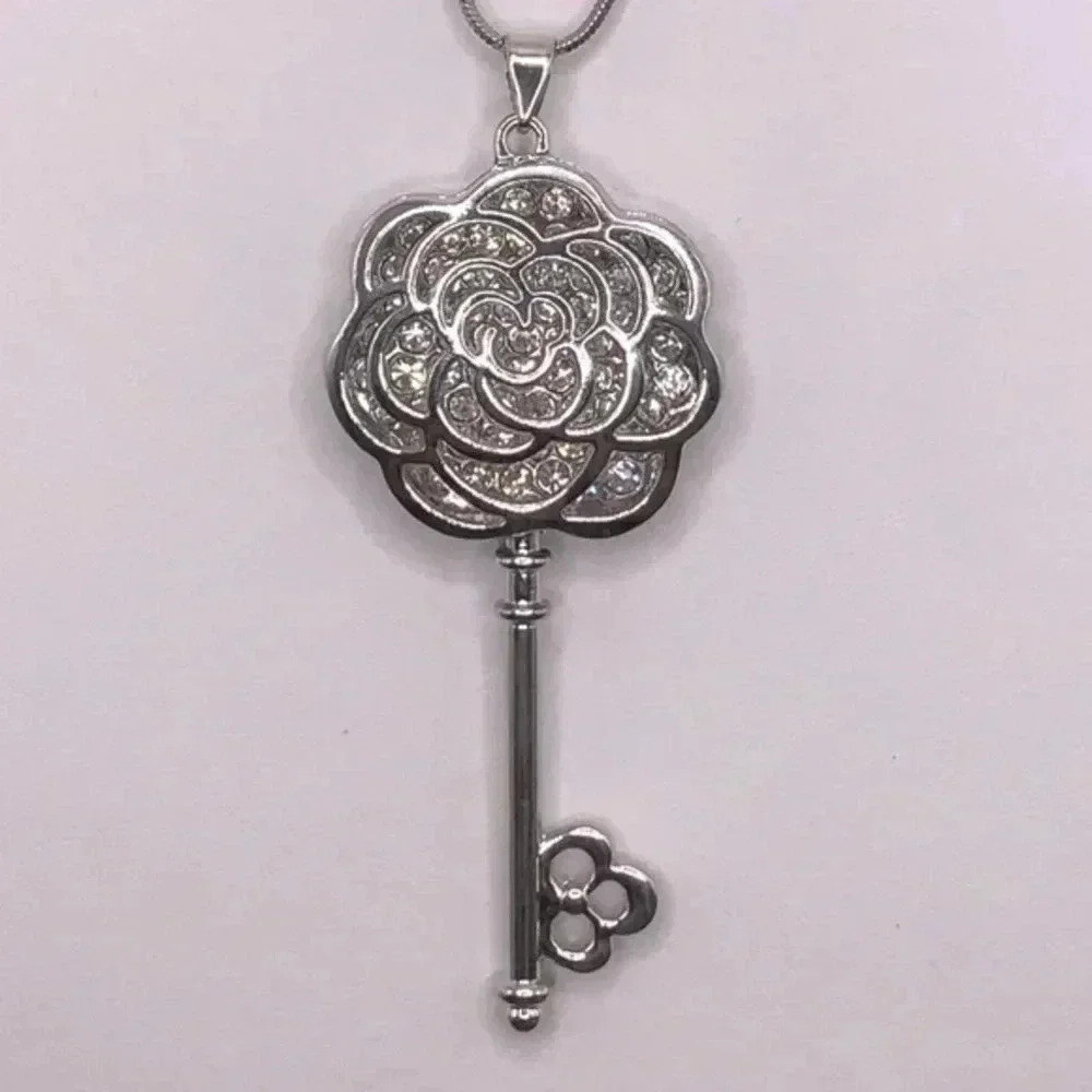 Big Silver Bejeweled Crystal Flower Rose Key Long Sweater Necklace New NWT